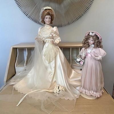 LOT 85: Porcelain Dolls a Bride and Her Flower Girl