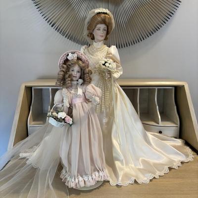 LOT 85: Porcelain Dolls a Bride and Her Flower Girl