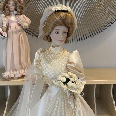 LOT 85: Porcelain Dolls a Bride and Her Flower Girl