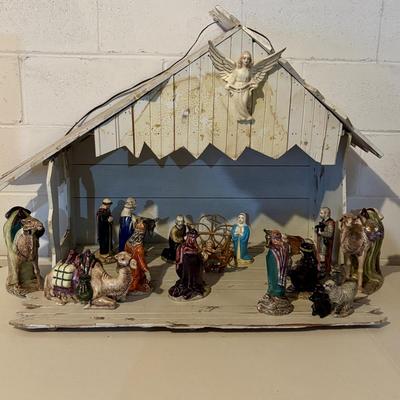 LOT 105: Vintage Handcrafted Nativity Set