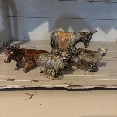 LOT 105: Vintage Handcrafted Nativity Set