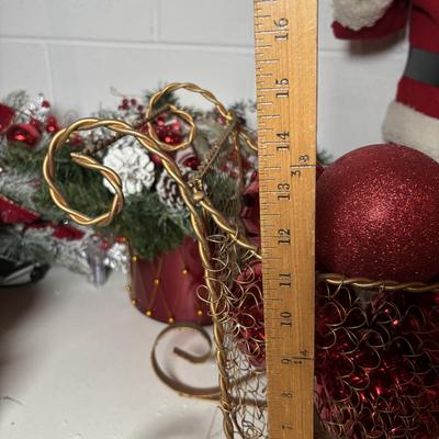 LOT 106: Holiday Decor: Santa Figure, Gold Wire Sleigh, Floral Centerpiece and More
