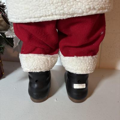 LOT 106: Holiday Decor: Santa Figure, Gold Wire Sleigh, Floral Centerpiece and More