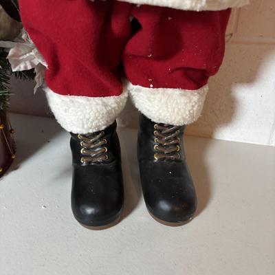 LOT 106: Holiday Decor: Santa Figure, Gold Wire Sleigh, Floral Centerpiece and More