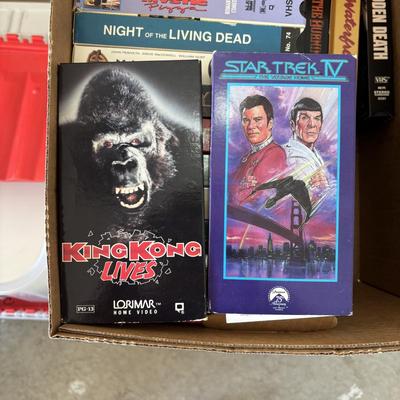 LOT 107: VHS Movie Collection & Unopened Bland VHS Tapes