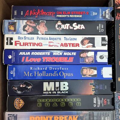 LOT 107: VHS Movie Collection & Unopened Bland VHS Tapes