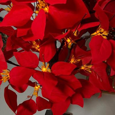 LOT 283: Holiday Decor Collection - Fiber Optic Poinsettia Trees and Animated Dolls