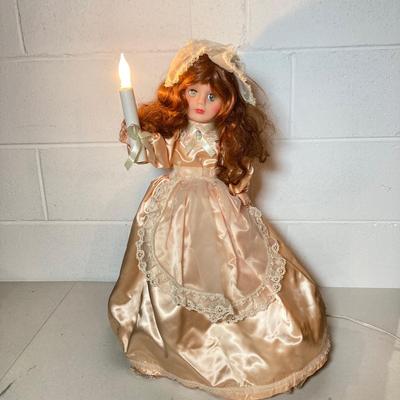 LOT 283: Holiday Decor Collection - Fiber Optic Poinsettia Trees and Animated Dolls