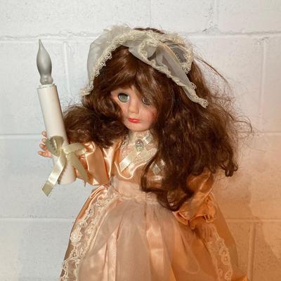 LOT 283: Holiday Decor Collection - Fiber Optic Poinsettia Trees and Animated Dolls