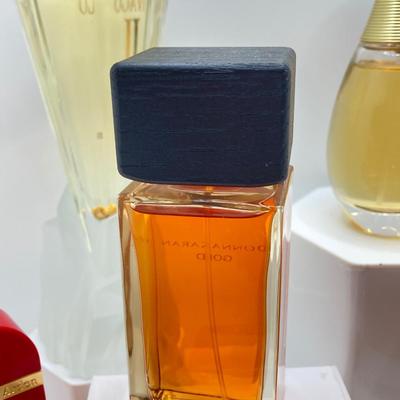 LOT 182: Collection of Perfume / - Hermes, Cartier, Donna Karan, Jivago, Elizabeth Arden and Christian Dior