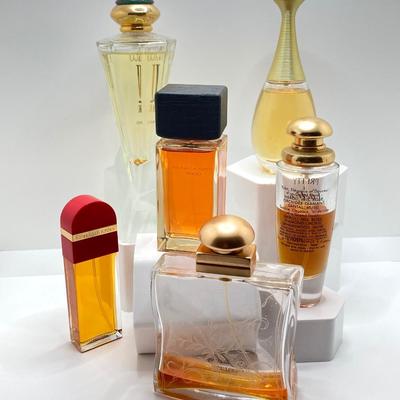 LOT 182: Collection of Perfume / - Hermes, Cartier, Donna Karan, Jivago, Elizabeth Arden and Christian Dior