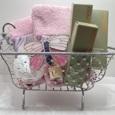 LOT 183: Decorative Wire Bathtub with HydroNova Skin Care Boxes, Hand Towels, Butterfly Shaped Night Light, Hand Towels and More