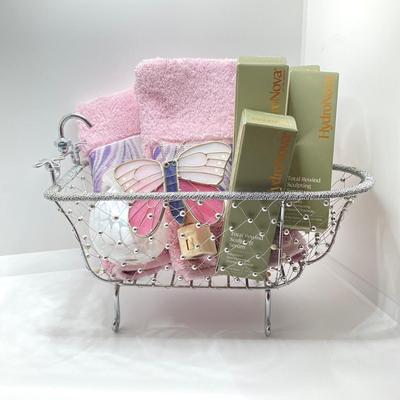 LOT 183: Decorative Wire Bathtub with HydroNova Skin Care Boxes, Hand Towels, Butterfly Shaped Night Light, Hand Towels and More
