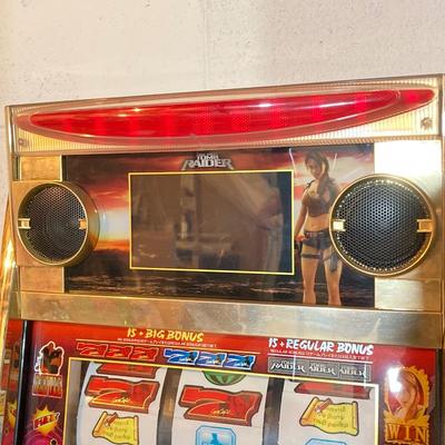 LOT 185: Lara Croft Tomb Raider Slot / Gaming Machine with Key and Tokens