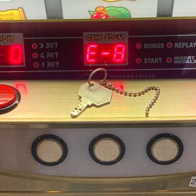LOT 185: Lara Croft Tomb Raider Slot / Gaming Machine with Key and Tokens