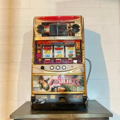 LOT 185: Lara Croft Tomb Raider Slot / Gaming Machine with Key and Tokens
