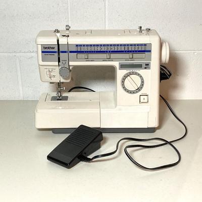 LOT 187: Brother Sewing Machine and Oreck Cord Free TX850 Iron