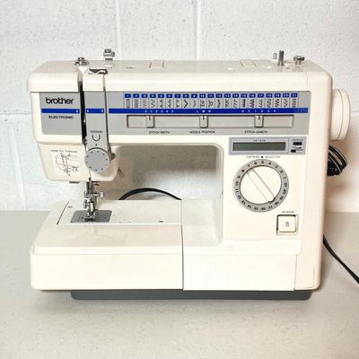 LOT 187: Brother Sewing Machine and Oreck Cord Free TX850 Iron