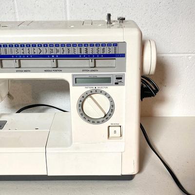 LOT 187: Brother Sewing Machine and Oreck Cord Free TX850 Iron