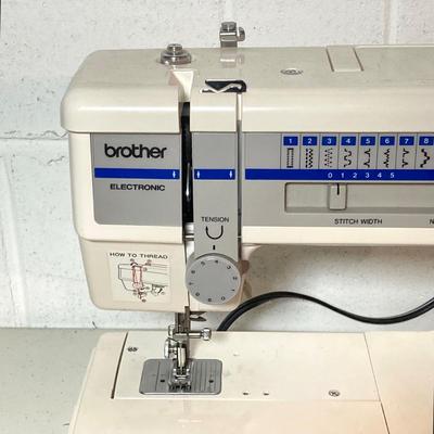 LOT 187: Brother Sewing Machine and Oreck Cord Free TX850 Iron