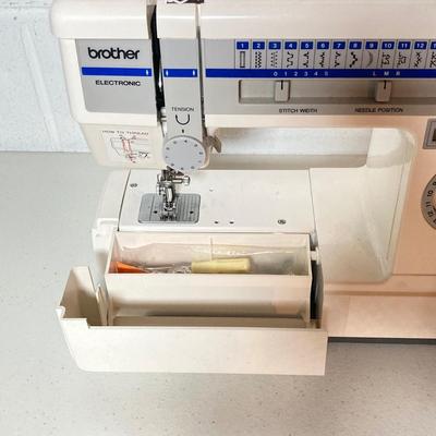 LOT 187: Brother Sewing Machine and Oreck Cord Free TX850 Iron