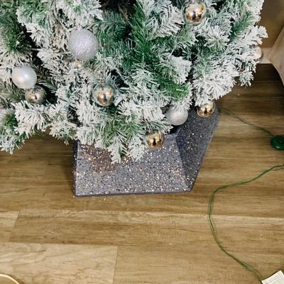 LOT 193: Flocked and Pre-lit Christmas Tree with White and Colored Lights