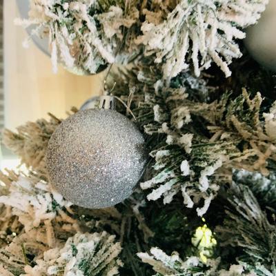 LOT 193: Flocked and Pre-lit Christmas Tree with White and Colored Lights