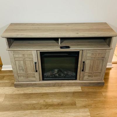 LOT 195: Television Stand with 18’ Electric Fireplace Heater