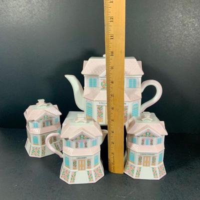 LOT 210: Lenox The Love Village Tea Pot, with Lid, Creamer, and Two(2) Sugar Bowls