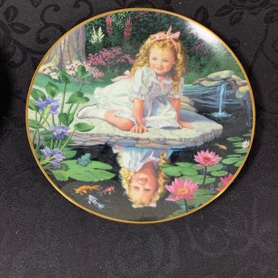LOT 215: Assortment of Collectors Plates by Knowles, Danbury Mint and Franklin Mint