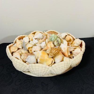 LOT 222: Beach Inspired Decor Featuring Sea Shell Bowls Loaded with Seashells, Towels and Wall Art.