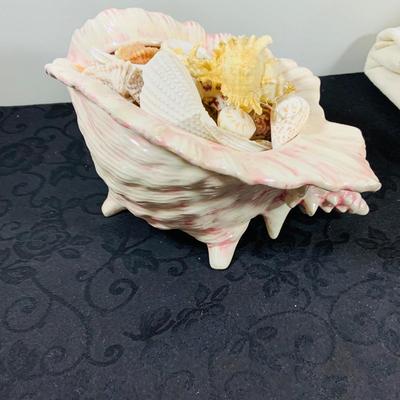 LOT 222: Beach Inspired Decor Featuring Sea Shell Bowls Loaded with Seashells, Towels and Wall Art.