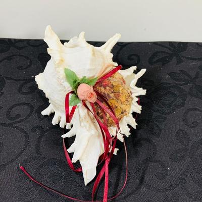 LOT 222: Beach Inspired Decor Featuring Sea Shell Bowls Loaded with Seashells, Towels and Wall Art.