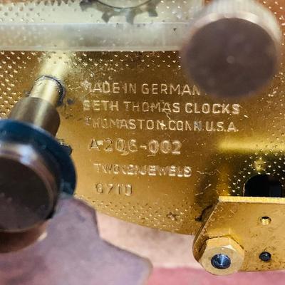 LOT 226: Seth Thomas Mechanical Mantle Clock and Glass Galileo Thermometer