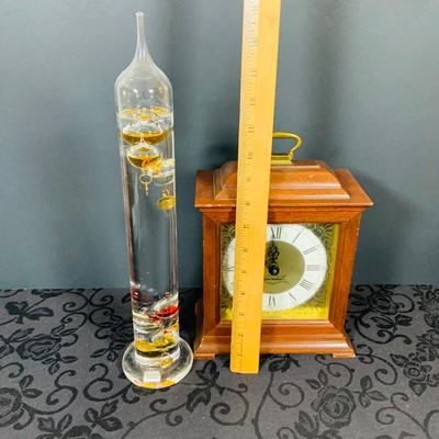 LOT 226: Seth Thomas Mechanical Mantle Clock and Glass Galileo Thermometer