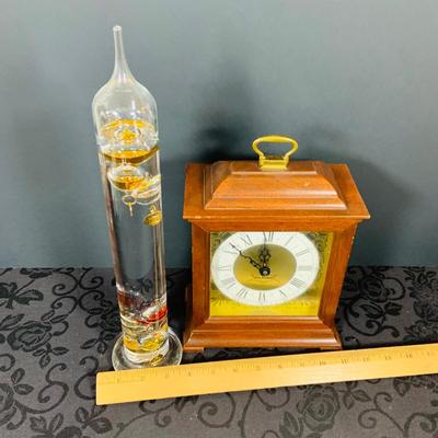 LOT 226: Seth Thomas Mechanical Mantle Clock and Glass Galileo Thermometer