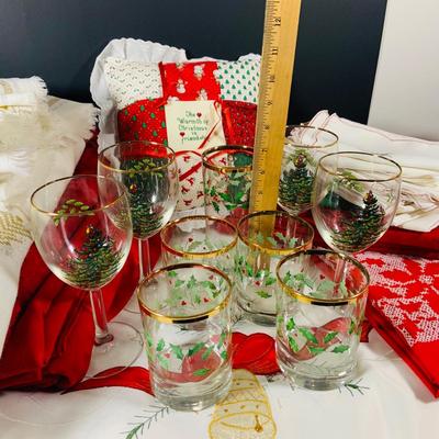 LOT 238: Large Selection of Christmas Linens, Holiday Glasses and Metal Decor
