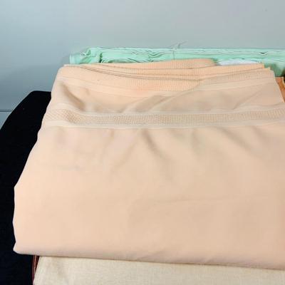 LOT 240: Large Selection of Lines -Table Cloths, Napkins and: Home Decor