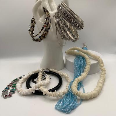 LOT 241: Fashion Bracelets and Necklaces Including Pukka Shell and More