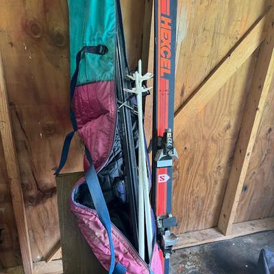 Sale Photo Thumbnail #179: Ski boots and and two pairs of skis 
Excel & kastle and poles
