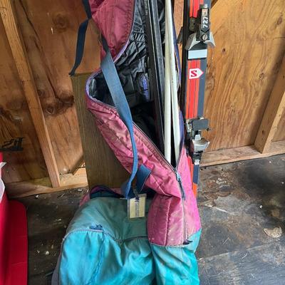 Sale Photo Thumbnail #181: Ski boots and and two pairs of skis 
Excel & kastle and poles