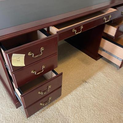 Sale Photo Thumbnail #162: Execite desk with 6 drawers with writing pad top