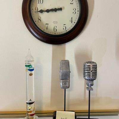 Sale Photo Thumbnail #171:  2 microphone props, sterling & noble clock and galileo thermometer 