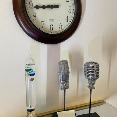 Sale Photo Thumbnail #172:  2 microphone props, sterling & noble clock and galileo thermometer 