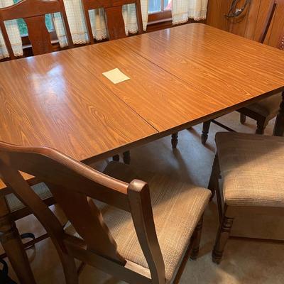 Sale Photo Thumbnail #359: Table with formica top includes 1 leaf and 6 chairs 