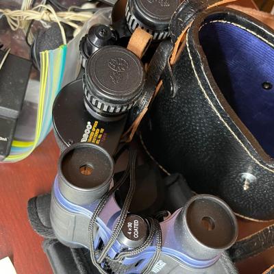 Sale Photo Thumbnail #395: Vintgage Binoculars, 8mm film, Projector screen & ligh
