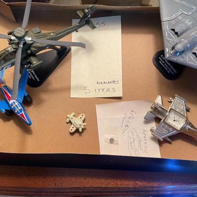Sale Photo Thumbnail #462: Small airplane collection with 1 items as an airplance clock 