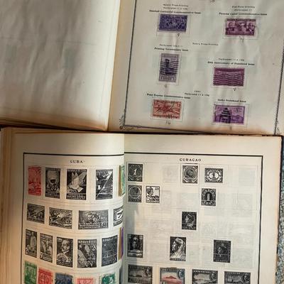 Sale Photo Thumbnail #469: 2 postage stamp albums along with asst stamps 