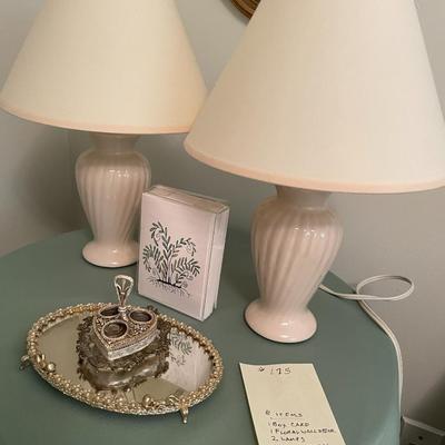 Sale Photo Thumbnail #532: 2 small ivory lamps, table, floral wall décor, glass tray, lipstick holder, box of cards