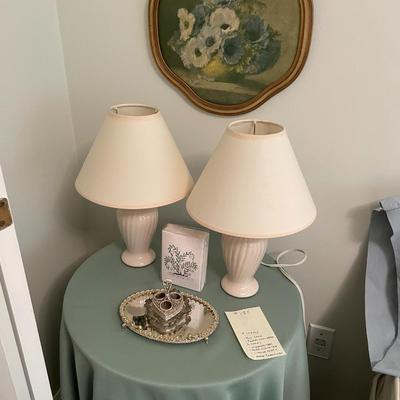 Sale Photo Thumbnail #531: 2 small ivory lamps, table, floral wall décor, glass tray, lipstick holder, box of cards
